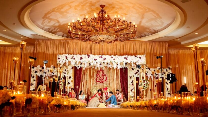 Indian bride and groom during a traditional wedding ceremony with floral decor