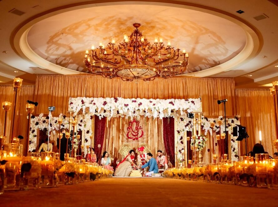 Indian bride and groom during a traditional wedding ceremony with floral decor